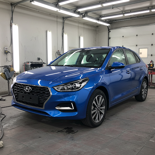 Blue sedan fully restored after collision repair