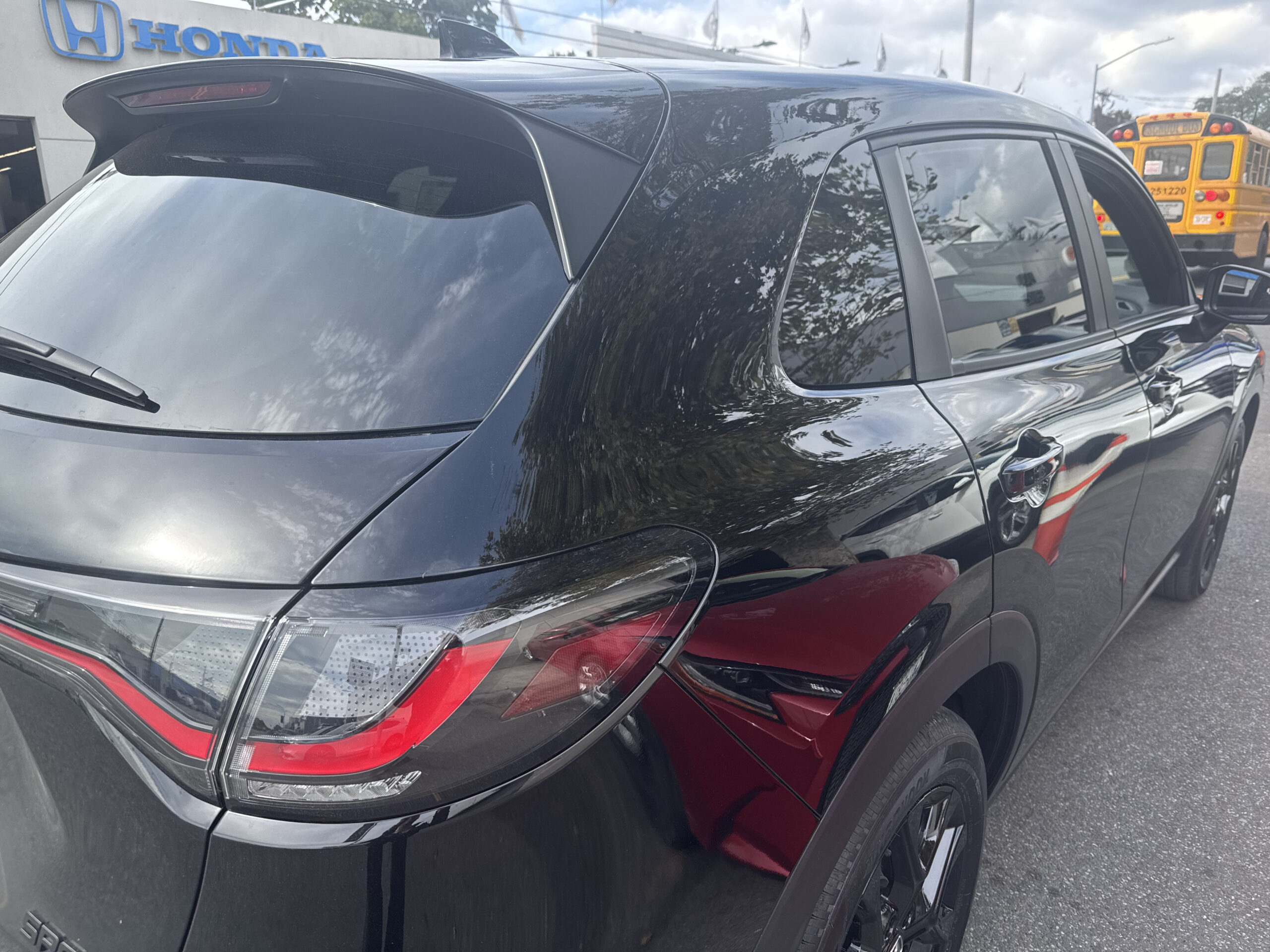 Black SUV after Plaza Body Shop restored the passenger-side body panels